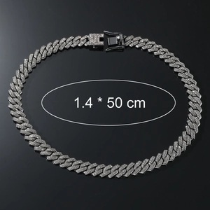 Detail view of 1.4cm wide iced out Cuban link chain with 50cm length and safety clasp