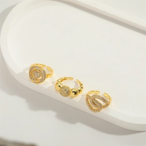 Three-piece set of adjustable gold rings with zircon heart and twist designs for women