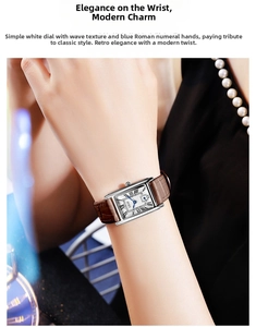 Detail of square quartz watch with brown leather strap and white wavy textured dial