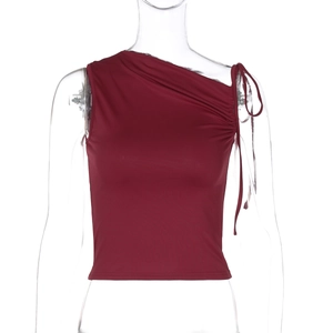 Detail view of burgundy wine red asymmetrical neck top with drawstring shoulder tie