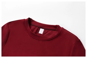 Detail of double-needle stitching on the neckline of a burgundy quick-dry yoga T-shirt