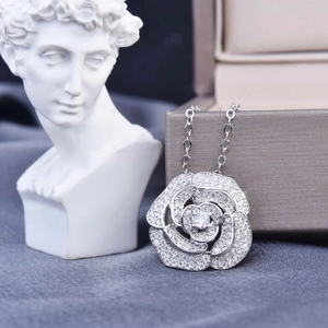 Sparkling silver rose pendant necklace with crystal pavé and elegant floral design