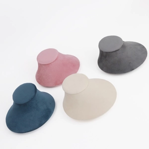 Velvet necklace display busts in four colors for jewelry window presentation