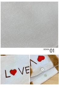 Detail view of white cashmere tote bag with red heart embroidery and magnetic closure