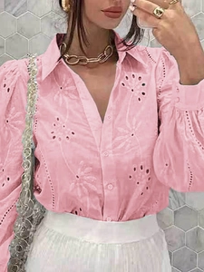 Detail of pink hollow out embroidery on stylish long lantern sleeve women shirt