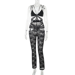 Sexy black lace cutout bodysuit with halter neck and open back design on white background