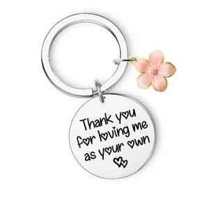 Detail of engraved keychain with Pink Flower charm and Thank you for loving me text