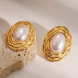 Vintage gold oval earrings with pearl inlay and braided texture on stone base