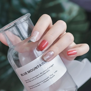Elegant thin adhesive nail stickers featuring red gradients and golden marble textures