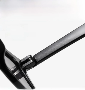 Macro shot of durable black sunglasses hinge ensuring smooth opening and closing