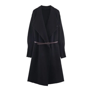 Elegant black long knit coat with a wide lapel and dark brown slim leather belt accessory