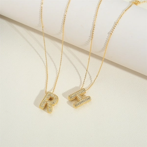 Retro luxury gold initial pendant necklace with R and H letters and zircon pavé