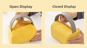Details einer gelben wasserdichten Kulturtasche im offenen und geschlossenen Zustand