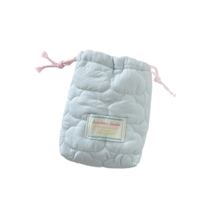 Light blue quilted camera pouch with cloud texture and pink drawstring on white background