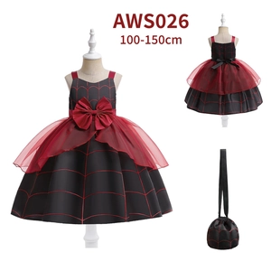 Detail of girls' Halloween witch dress with red spider web pattern and matching handbag
