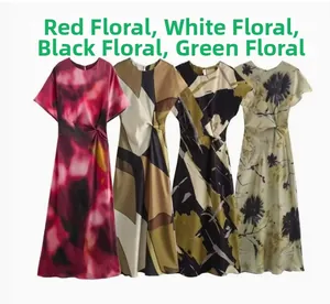 Detail view of four elegant short-sleeve dresses with assorted prints and waist pleats