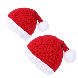 Classic red and white knit Santa hats with thick wool texture for family holiday gifts