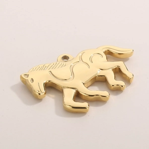 Macro shot of gold horse pendant with polished finish and integrated hanging loop
