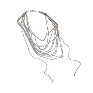 Minimalist silver multilayer metal chain necklace with geometric layers on white background