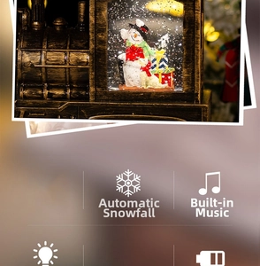 Close-up of vintage bronze train snow globe with music and automatic snowfall feature