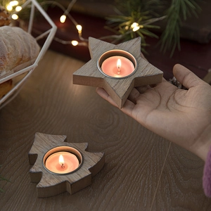 Nordic wooden snowflake candle holders in star and tree shapes for Christmas decor