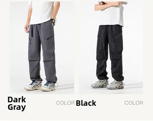 Detail view of cargo pants with large side pockets, zip features, and drawstring hem