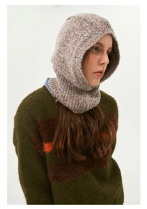 Side view of grey speckled knit balaclava hood showing soft texture and cozy coverage