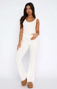 White ribbed knit sleeveless top and flare trousers two-piece set for women