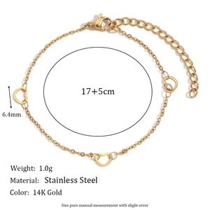 Minimalist stainless steel 14K gold-plated heart link bracelet on white background