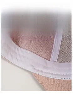 Close-up of the widened sweatband and breathable mesh interior of the herringbone cap