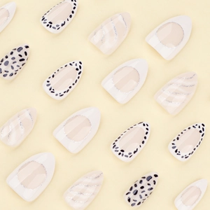 Almond-shaped press-on nails with leopard print and silver glitter wave line designs