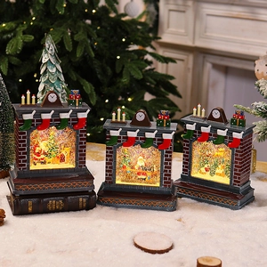 Three-piece set of Christmas fireplace lanterns with Santa, tree, and glowing snow scene