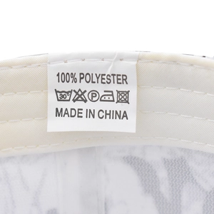 Detail of internal care label showing 100% polyester fabric and washing instructions
