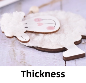 Detail shot showing the thickness of the wool felt sheep ornament with wooden texture