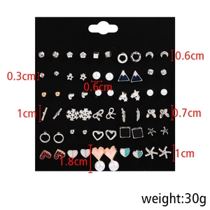Set of 30 pairs of pearl and rhinestone earrings in heart and leaf shapes