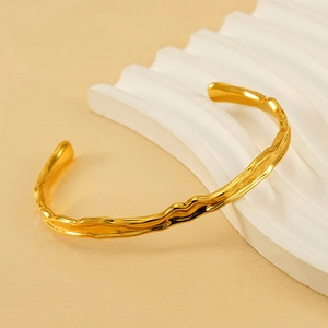 Minimalist 18K gold plated stainless steel open bangle with irregular hammered texture
