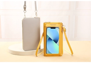 Close-up of gray and yellow PU leather touch-screen phone bags with metal buckles