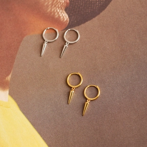 Detailed view of S925 sterling silver hoop earrings with cone pendants in gold and silver