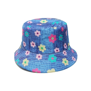 Close-up of denim blue sun hat with floral print and detailed reinforced brim stitching