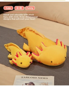 Detail view of large and small yellow axolotl plush toys in a cozy home setting