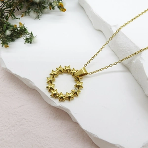 18K gold plated titanium necklace with stylish hollow star-shaped circular pendant charm
