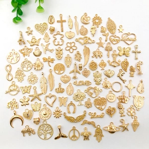 Assorted gold alloy charms for DIY jewelry making including animals and heart shapes