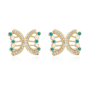 Detail of 18K gold-plated butterfly studs with blue enamel and clear zircon stones
