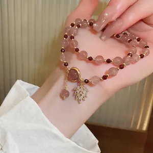 Multi-layer freshwater pearl and strawberry quartz beaded bracelet with zircon leaf pendant