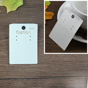 Detailed 5x7cm white jewelry card showing S925 engraving and holes for earrings and necklaces