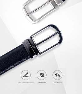 Close-up of premium black cowhide leather belt with fine lychee grain and alloy buckle