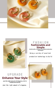 Detail of multi-colored natural stone hoops and 18K gold plated chain link earrings