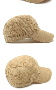 Detail of beige knit baseball cap with sequins and interlocking textured pattern