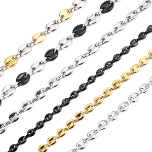 Macro view of assorted coffee bean links in gold, silver, and black stainless steel