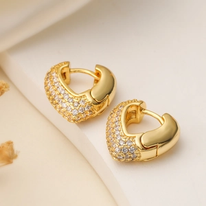 18K gold plated heart hoop earrings with sparkling cubic zirconia on light background